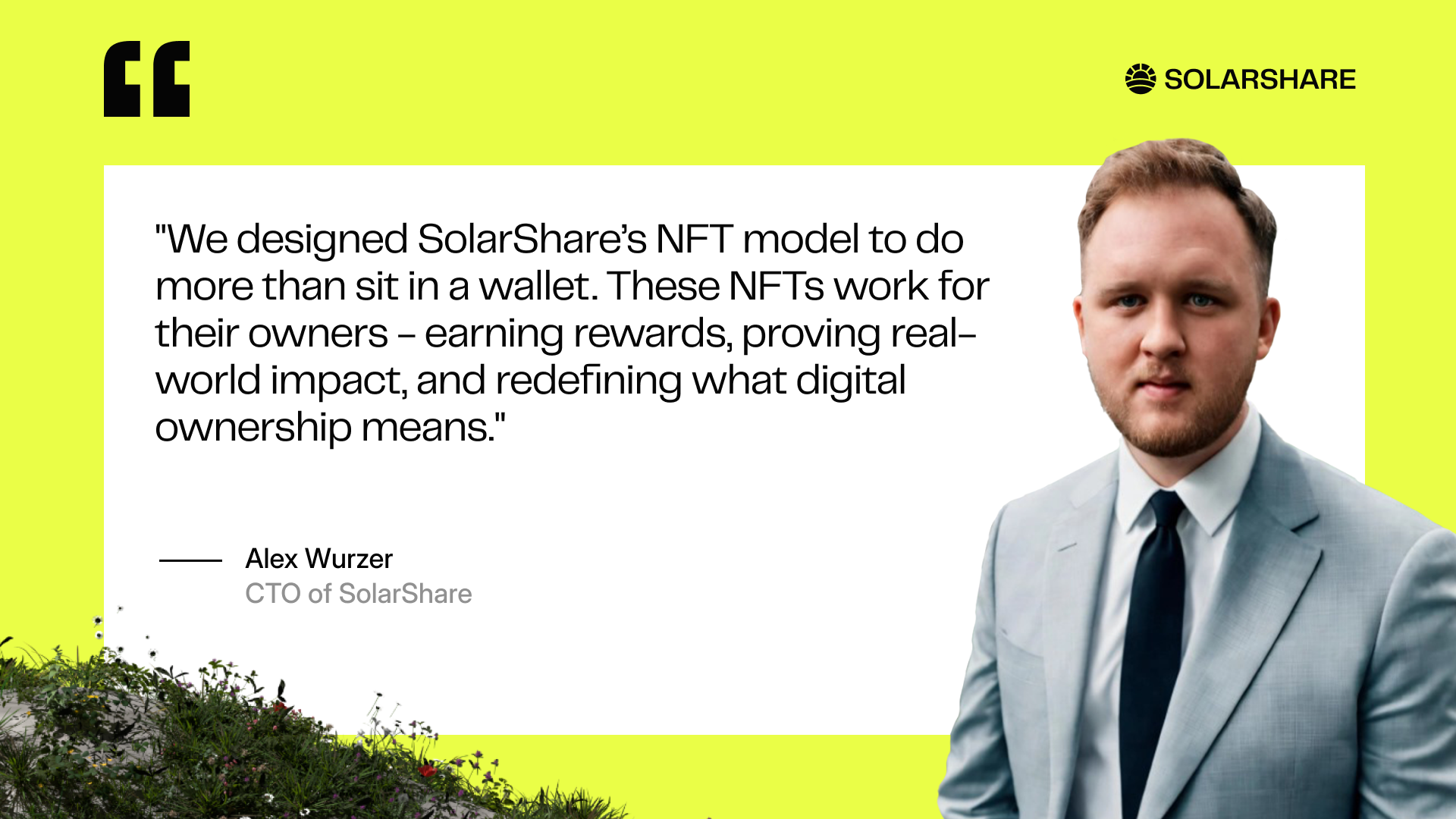 Alex the CTO of SolarShare standing next to a quote of his